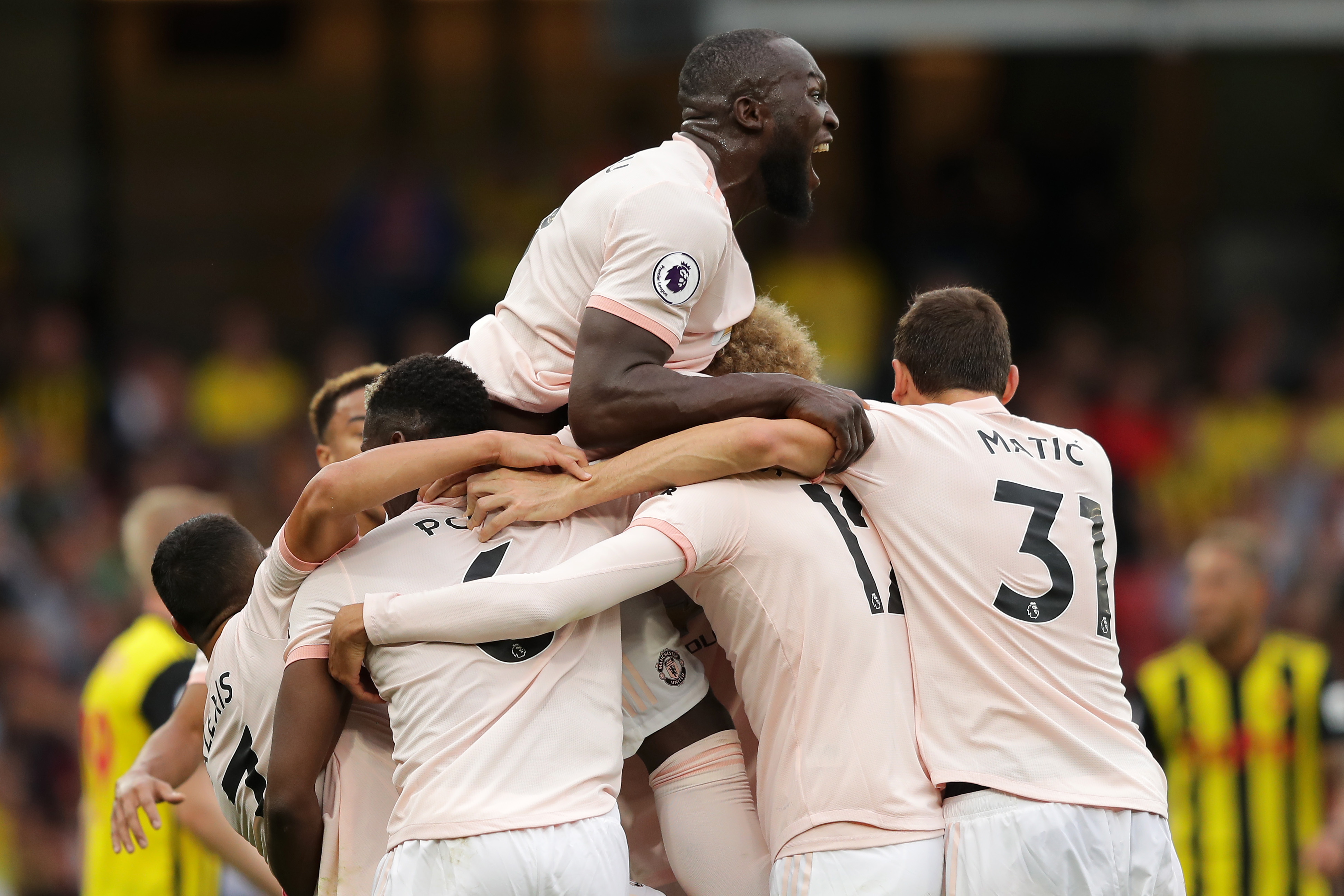 WATFORD, ENGLAND - SEPTEMBER 15: Chris Smalling of Manchester United celebrates with teammates after scoring his team's second goal during the Premier League match between Watford FC and Manchester United at Vicarage Road on September 15, 2018 in Watford, United Kingdom. (Photo by Richard Heathcote/Getty Images)