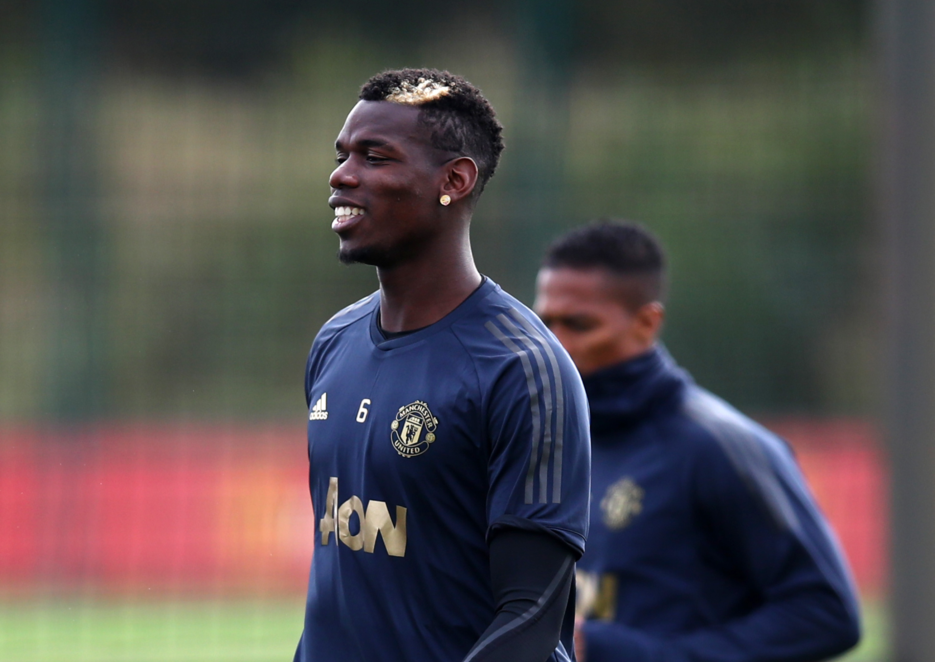 MANCHESTER, ENGLAND - OCTOBER 01: Paul Pogba of Manchester United looks on during a training session ahead of their Group H match against Valencia in UEFA Champions League at Aon Training Complex on October 1, 2018 in Manchester, England. (Photo by Clive Brunskill/Getty Images)