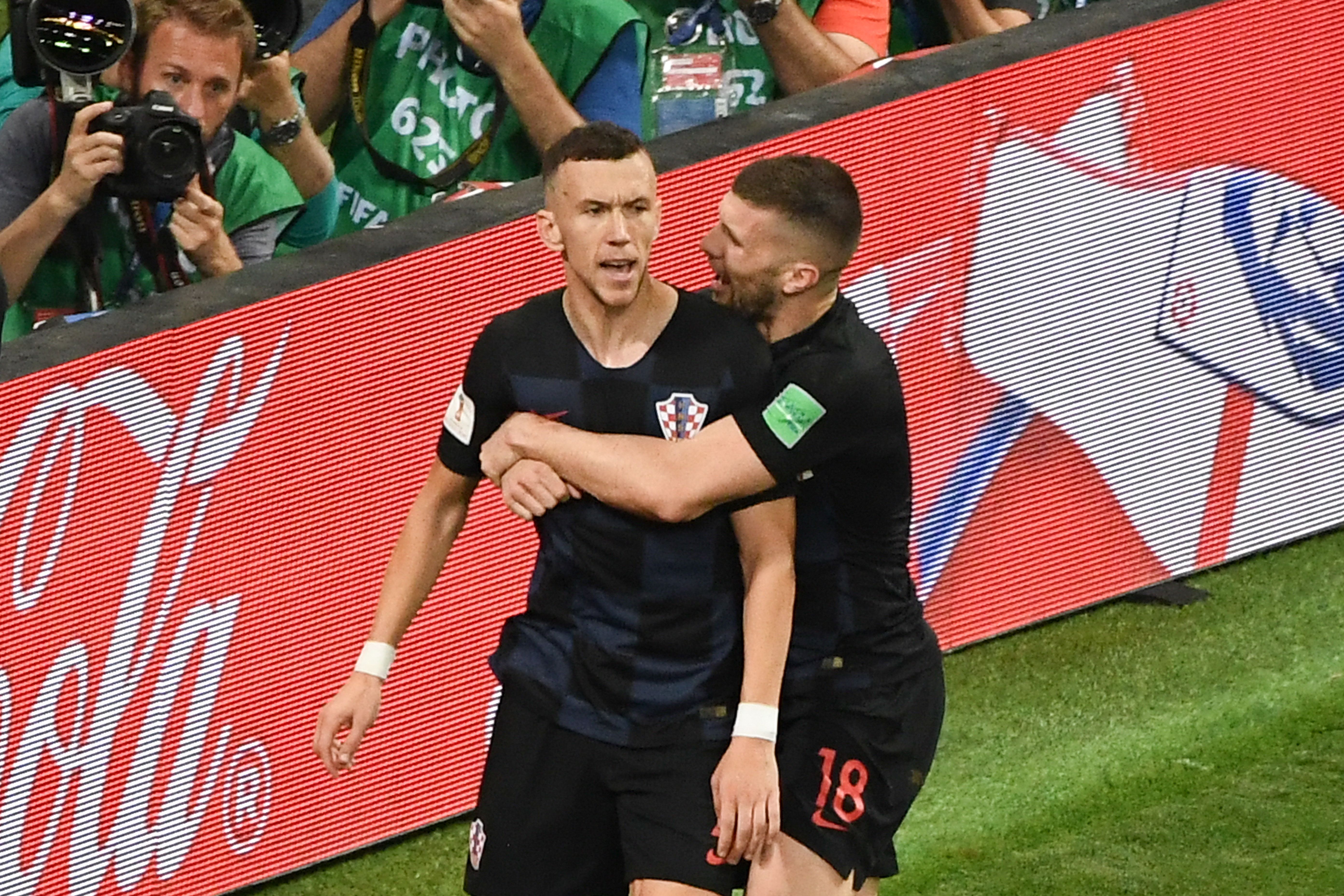Croatia's forward Ivan Perisic (L) celebrates with Croatia's forward Ante Rebic after scoring his team's first goal during the Russia 2018 World Cup semi-final football match between Croatia and England at the Luzhniki Stadium in Moscow on July 11, 2018. (Photo by Jewel SAMAD / AFP) / RESTRICTED TO EDITORIAL USE - NO MOBILE PUSH ALERTS/DOWNLOADS (Photo credit should read JEWEL SAMAD/AFP/Getty Images)