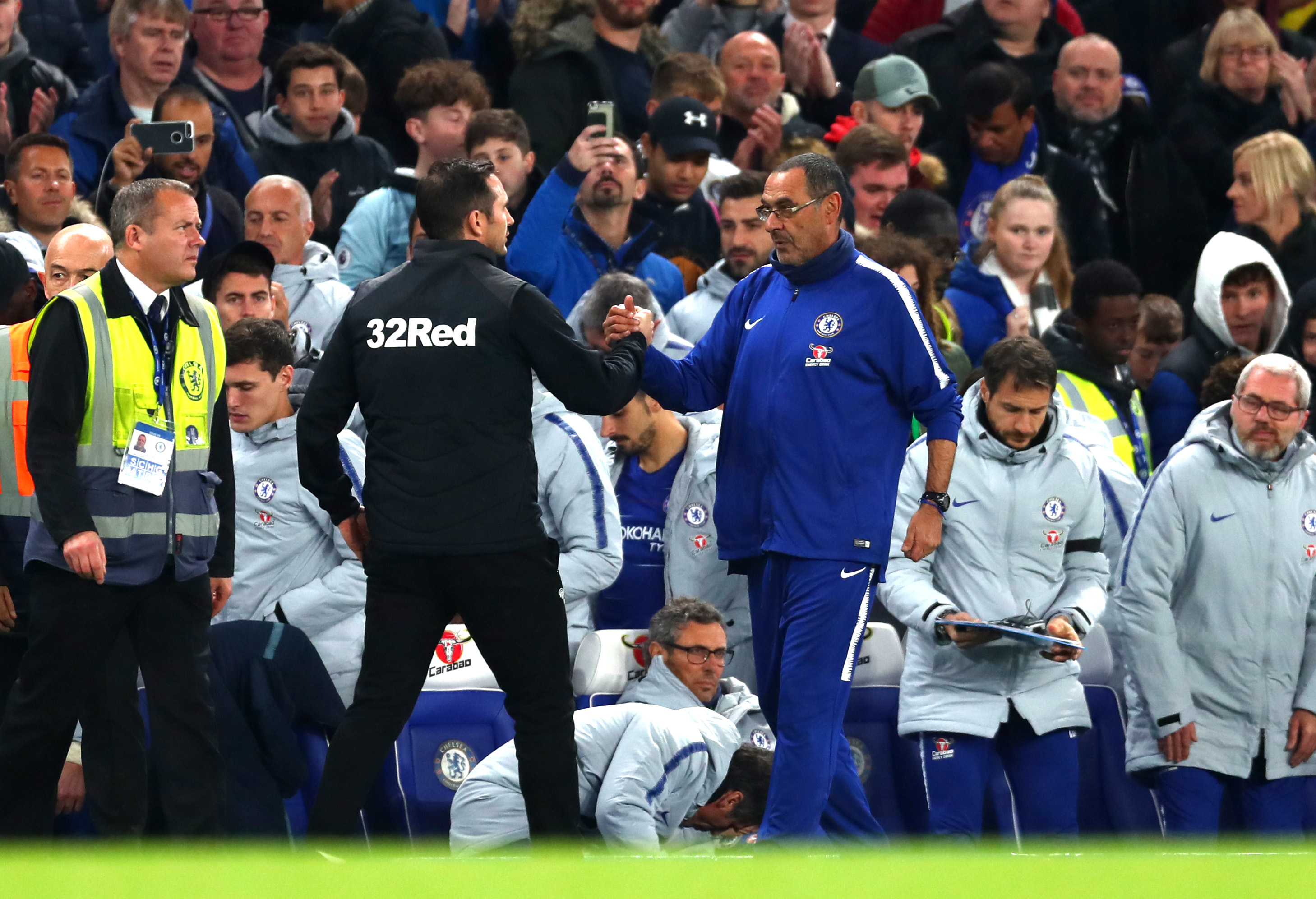 LONDON, ENGLAND - OCTOBER 31: Maurizio Sarri, Manager of Chelsea and Frank Lampard of Derby County shake hands after the Carabao Cup Fourth Round match between Chelsea and Derby County at Stamford Bridge on October 31, 2018 in London, England. (Photo by Clive Rose/Getty Images)