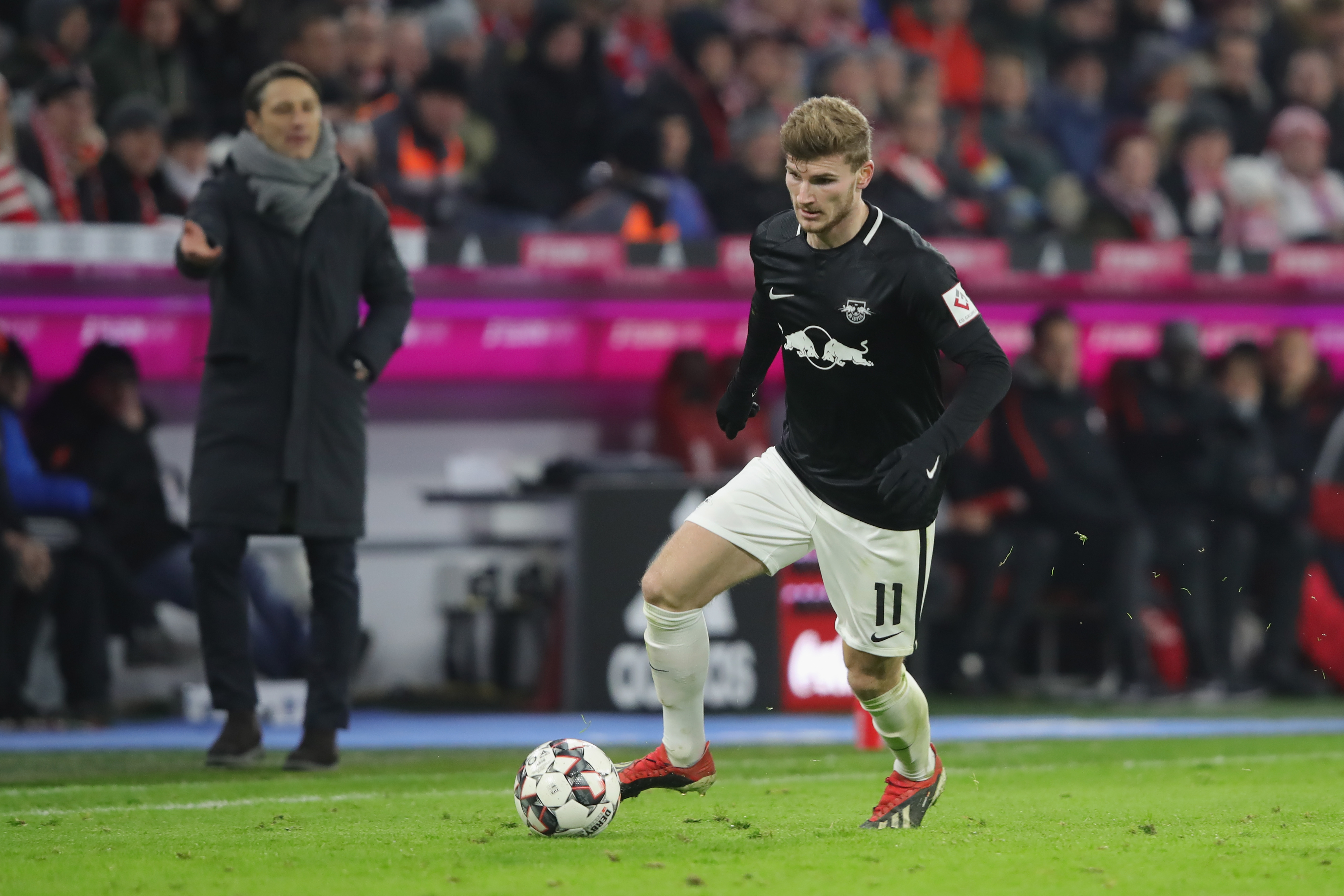 MUNICH, GERMANY - DECEMBER 19: Timo Werner of Leipzig runs with the ball during the Bundesliga match between FC Bayern Muenchen and RB Leipzig at Allianz Arena on December 19, 2018 in Munich, Germany. (Photo by Alexander Hassenstein/Bongarts/Getty Images)