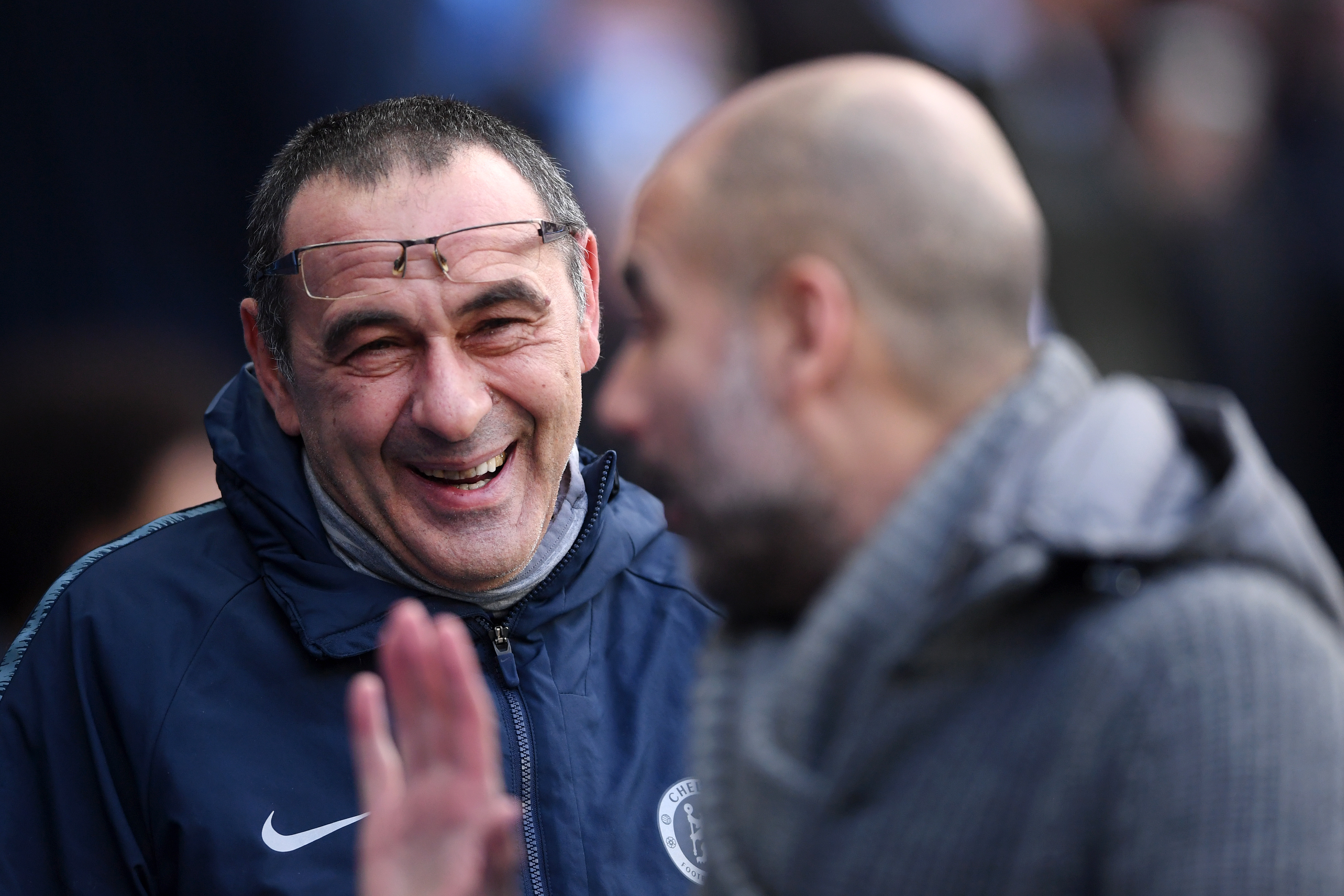MANCHESTER, ENGLAND - FEBRUARY 10: Maurizio Sarri, Manager of Chelsea speaks to Josep Guardiola, Manager of Manchester City prior to the Premier League match between Manchester City and Chelsea FC at Etihad Stadium on February 10, 2019 in Manchester, United Kingdom. (Photo by Laurence Griffiths/Getty Images)