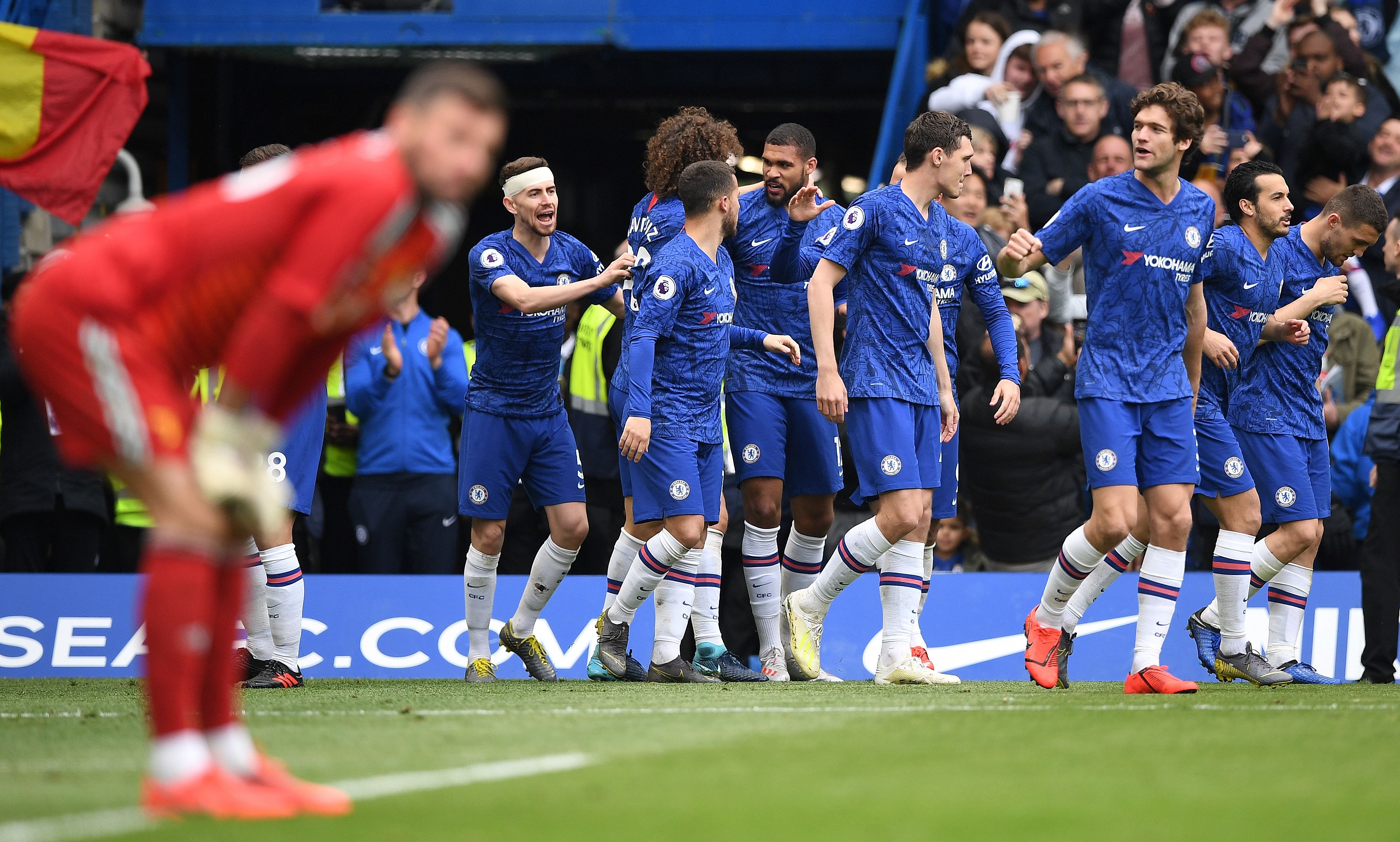 Chelsea's English midfielder Ruben Loftus-Cheek (C) celebrates scoring the opening goal during the English Premier League football match between Chelsea and Watford at Stamford Bridge in London on May 5, 2019. (Photo by Daniel LEAL-OLIVAS / AFP) / RESTRICTED TO EDITORIAL USE. No use with unauthorized audio, video, data, fixture lists, club/league logos or 'live' services. Online in-match use limited to 120 images. An additional 40 images may be used in extra time. No video emulation. Social media in-match use limited to 120 images. An additional 40 images may be used in extra time. No use in betting publications, games or single club/league/player publications. / (Photo credit should read DANIEL LEAL-OLIVAS/AFP/Getty Images)
