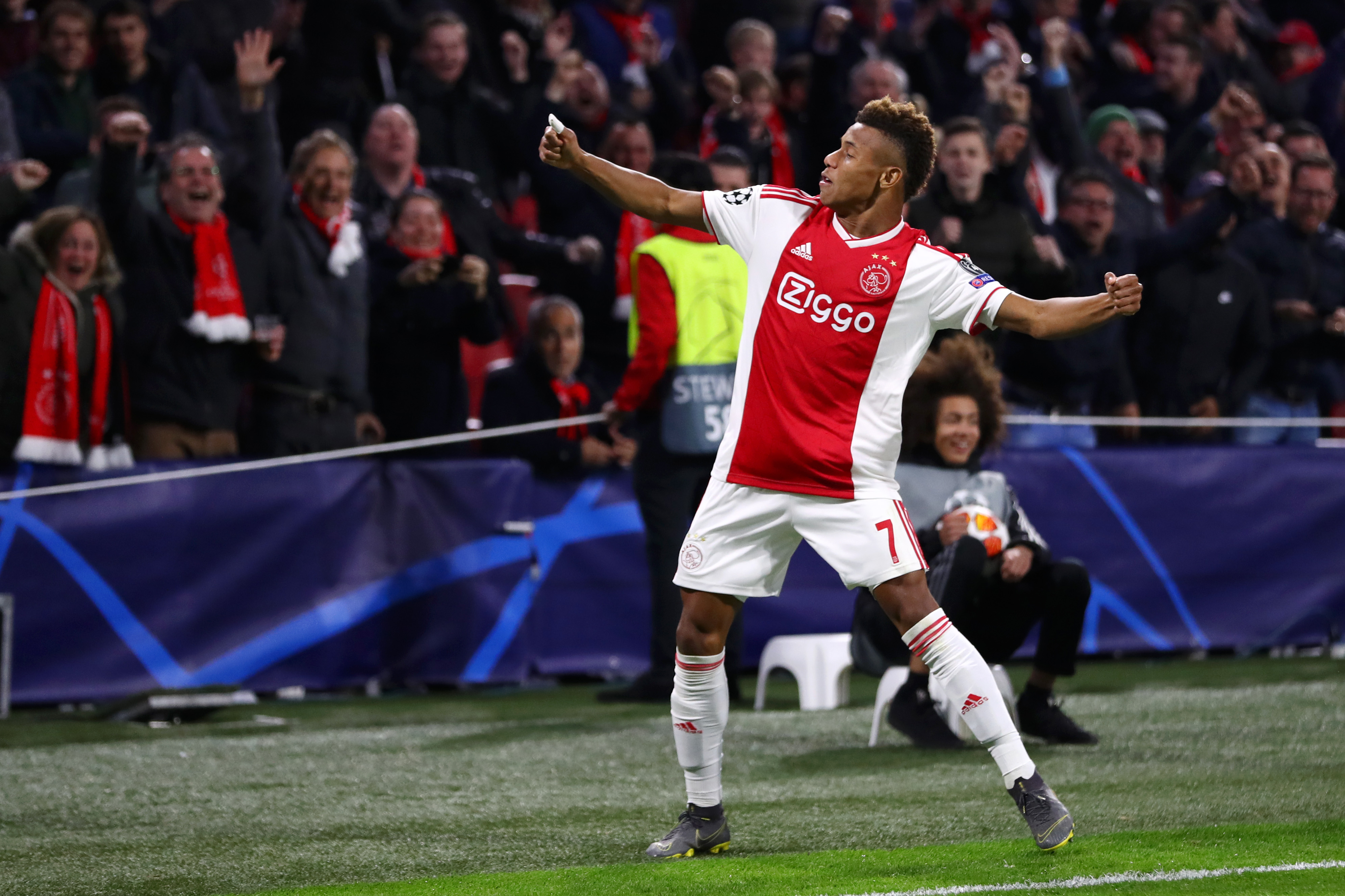 AMSTERDAM, NETHERLANDS - APRIL 10: David Neres of Ajax celebrates after scoring his team's first goal during the UEFA Champions League Quarter Final first leg match between Ajax and Juventus at Johan Cruyff Arena on April 10, 2019 in Amsterdam, Netherlands. (Photo by Michael Steele/Getty Images)