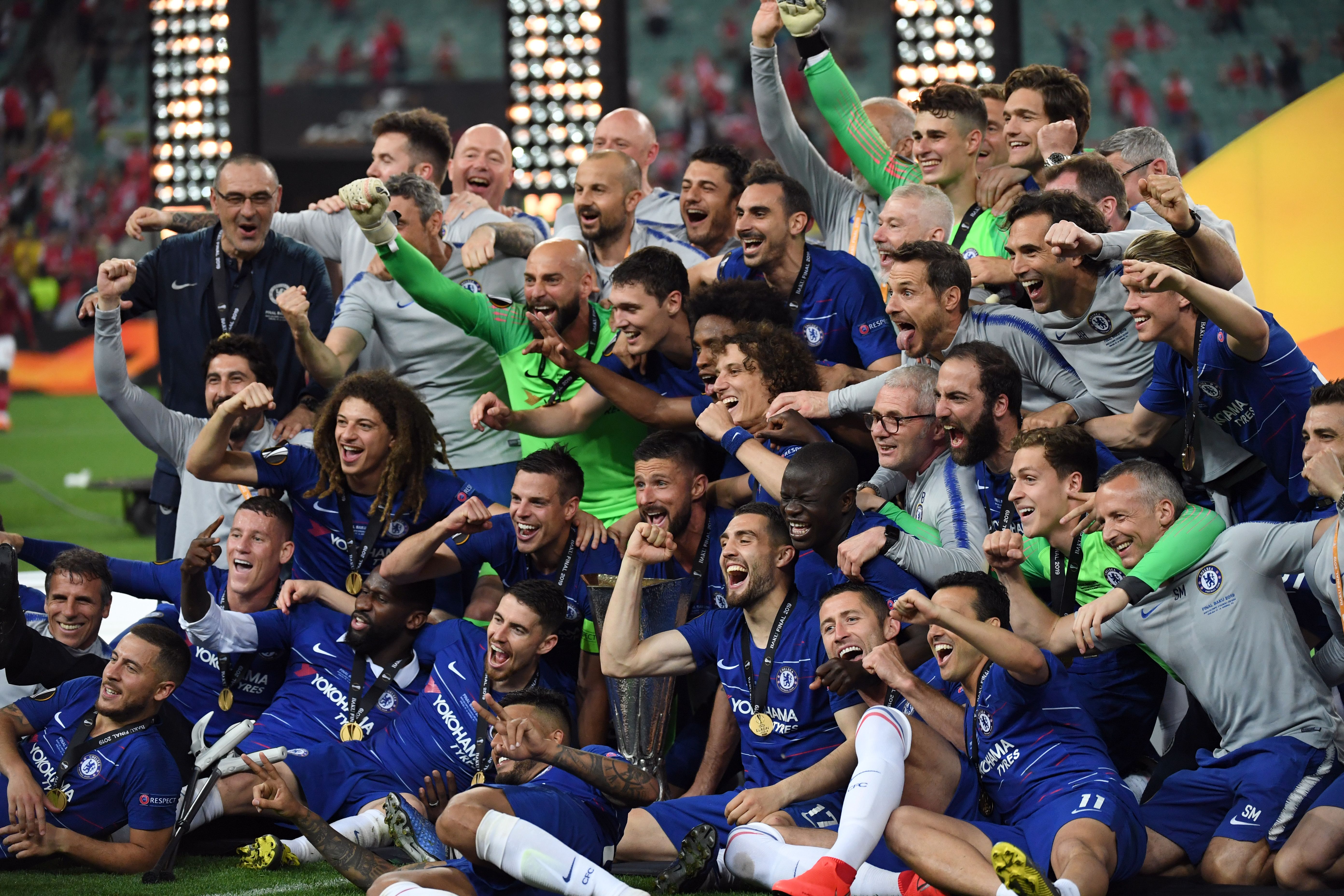 Chelsea's players celebrate with the trophy after winning the UEFA Europa League final football match between Chelsea FC and Arsenal FC at the Baku Olympic Stadium in Baku, Azerbaijian, on May 29, 2019. (Photo by OZAN KOSE / AFP) (Photo credit should read OZAN KOSE/AFP/Getty Images)