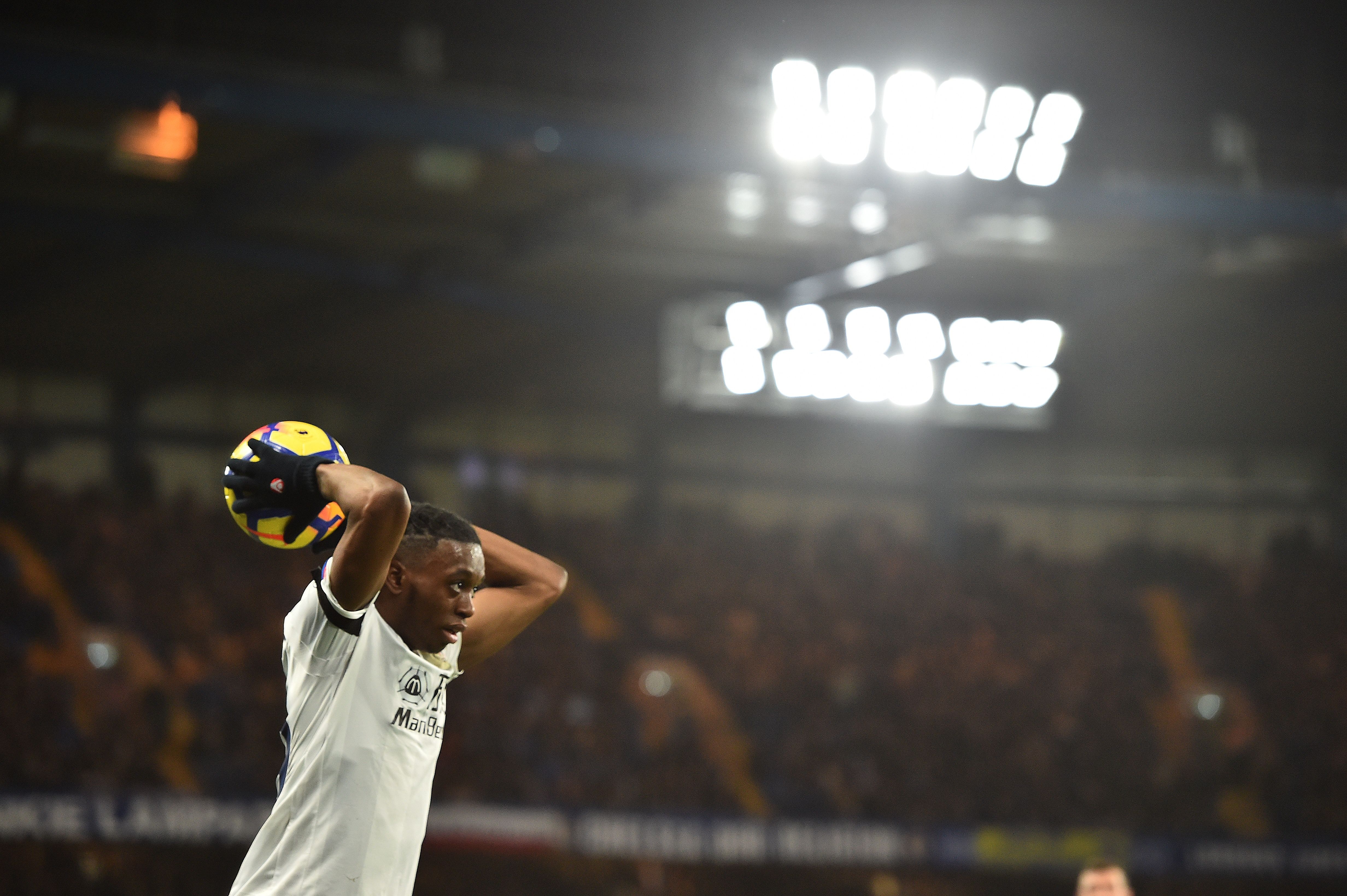 Crystal Palace's English midfielder Aaron Wan-Bissaka takes a throw-in during the English Premier League football match between Chelsea and Crystal Palace at Stamford Bridge in London on March 10, 2018. / AFP PHOTO / Glyn KIRK / RESTRICTED TO EDITORIAL USE. No use with unauthorized audio, video, data, fixture lists, club/league logos or 'live' services. Online in-match use limited to 75 images, no video emulation. No use in betting, games or single club/league/player publications. / (Photo credit should read GLYN KIRK/AFP/Getty Images)