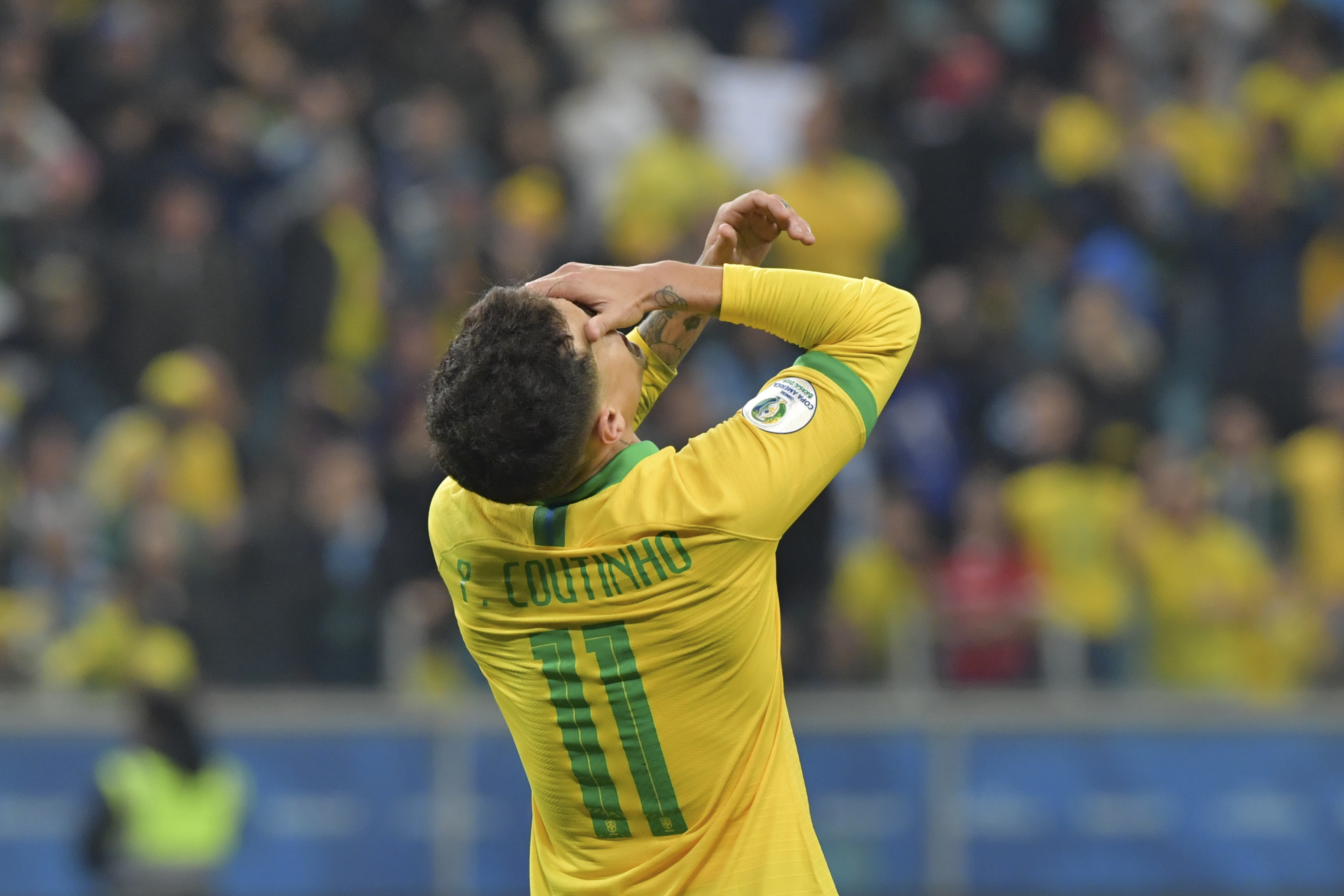 Brazil's Philippe Coutinho gestures after tying with Paraguay 0-0 and going the the penalty shoot-out during their Copa America football tournament quarter-final match at the Gremio Arena in Porto Alegre, Brazil, on June 27, 2019. (Photo by Luis ACOSTA / AFP) (Photo credit should read LUIS ACOSTA/AFP/Getty Images)
