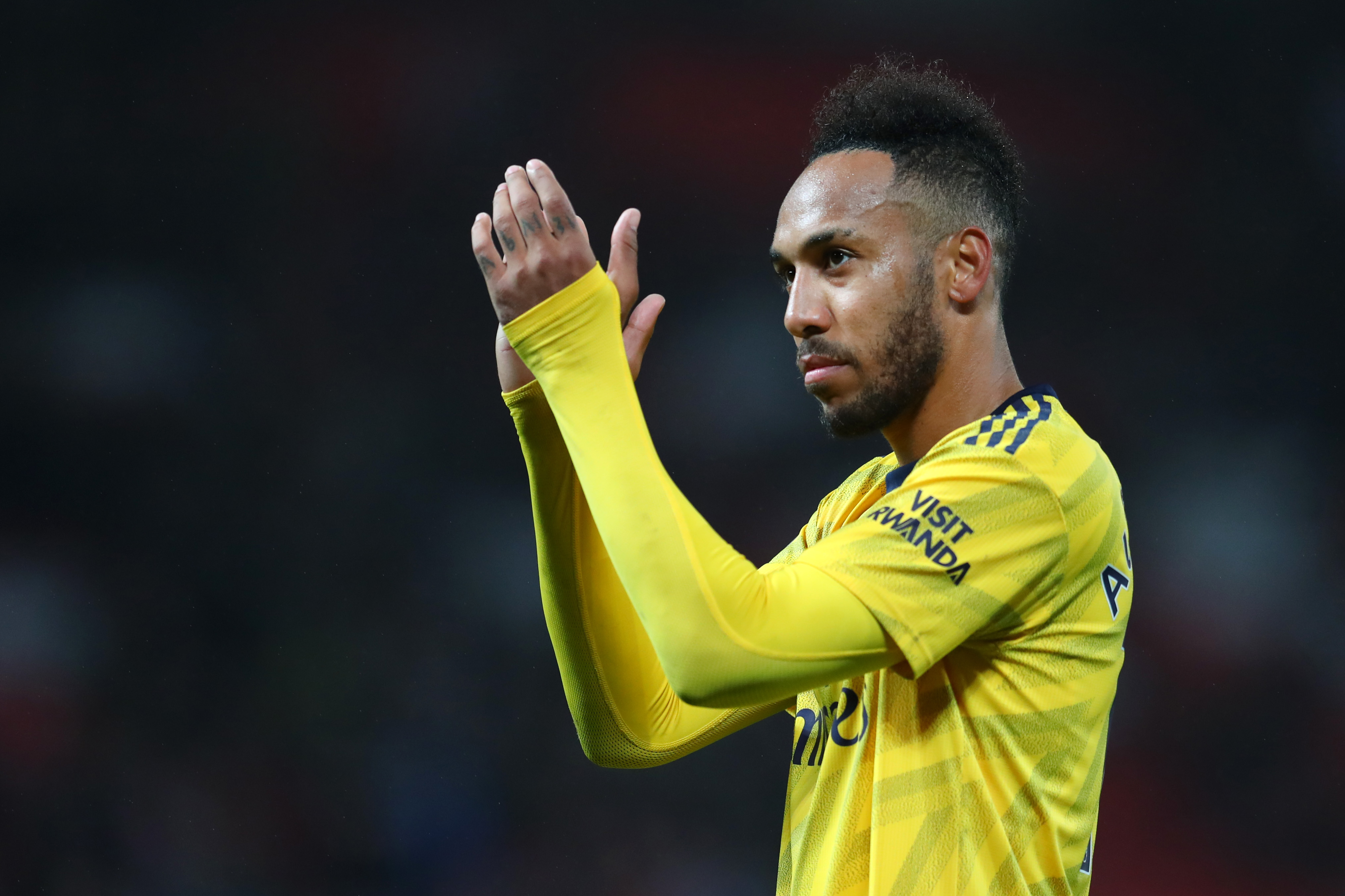 MANCHESTER, ENGLAND - SEPTEMBER 30:   Pierre-Emerick Aubameyang of Arsenal shows his appreciation to the fans after the Premier League match between Manchester United and Arsenal FC at Old Trafford on September 30, 2019 in Manchester, United Kingdom. (Photo by Catherine Ivill/Getty Images)