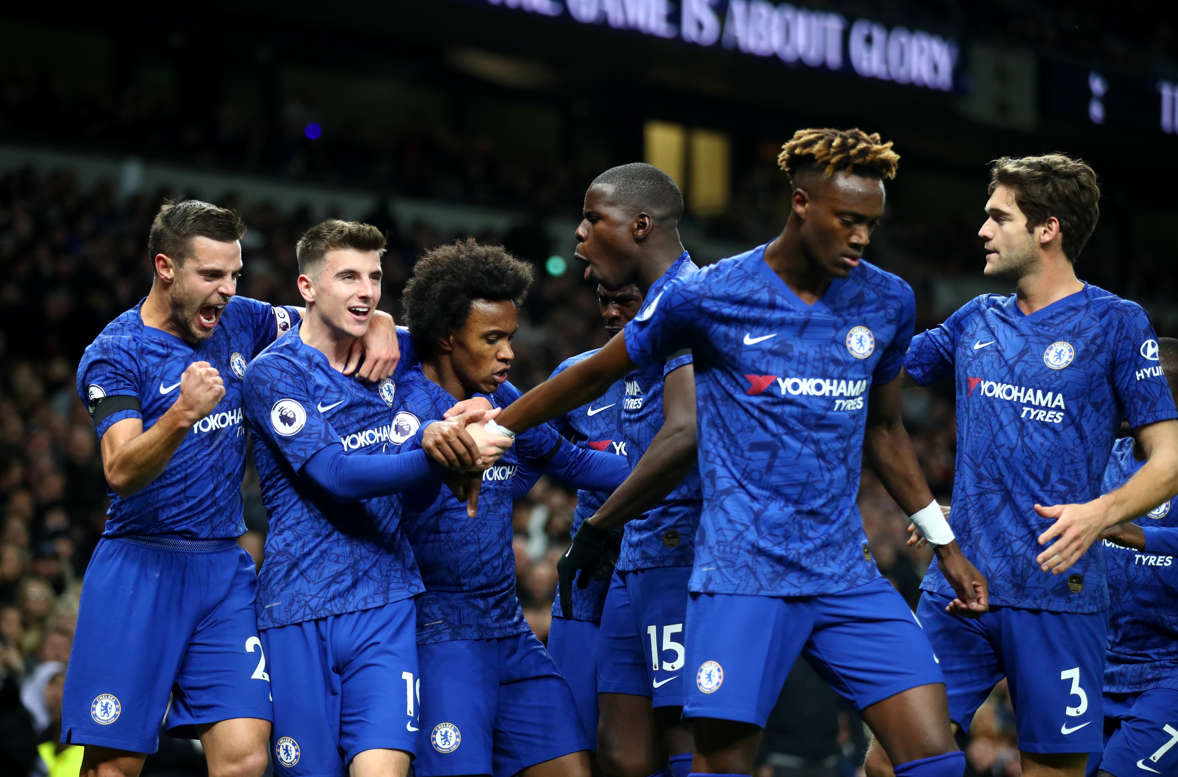 LONDON, ENGLAND - DECEMBER 22: Willian of Chelsea celebrates after scoring his sides first goal with team mates during the Premier League match between Tottenham Hotspur and Chelsea FC at Tottenham Hotspur Stadium on December 22, 2019 in London, United Kingdom. (Photo by Julian Finney/Getty Images)