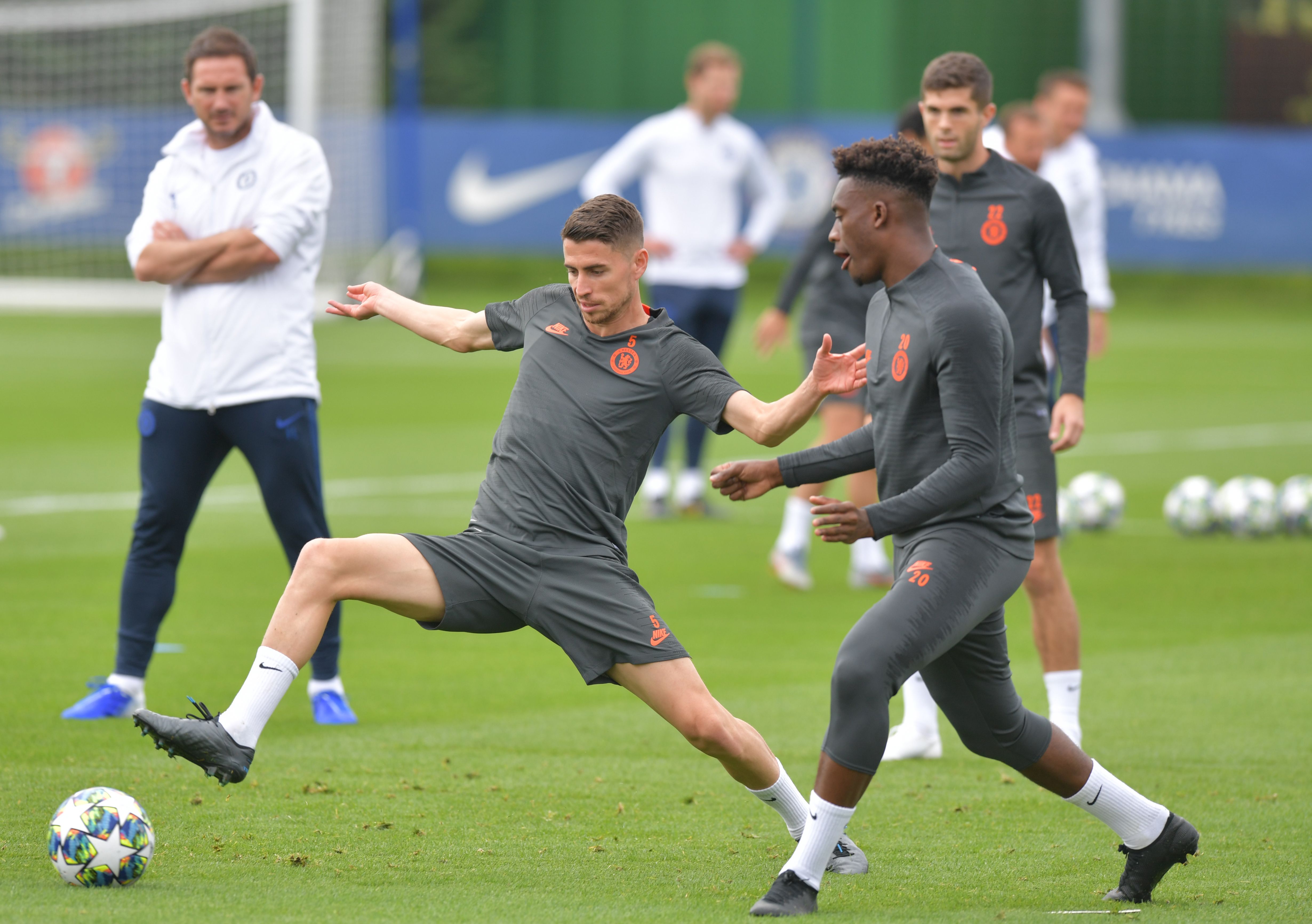 Chelsea's Italian midfielder Jorginho (L) and Chelsea's English midfielder Callum Hudson-Odoi take part in a training sesssion at their Cobham complex in south west London on the eve of their Champions league group stage football match against Valencia on September 16, 2019. (Photo by OLLY GREENWOOD / AFP) (Photo credit should read OLLY GREENWOOD/AFP via Getty Images)